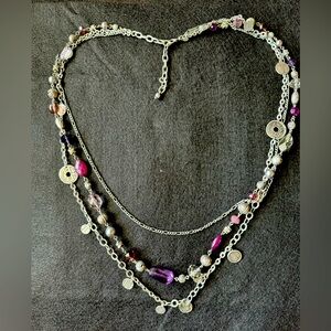 Unique 36” 3 strand tiered silver and glass bead necklace.